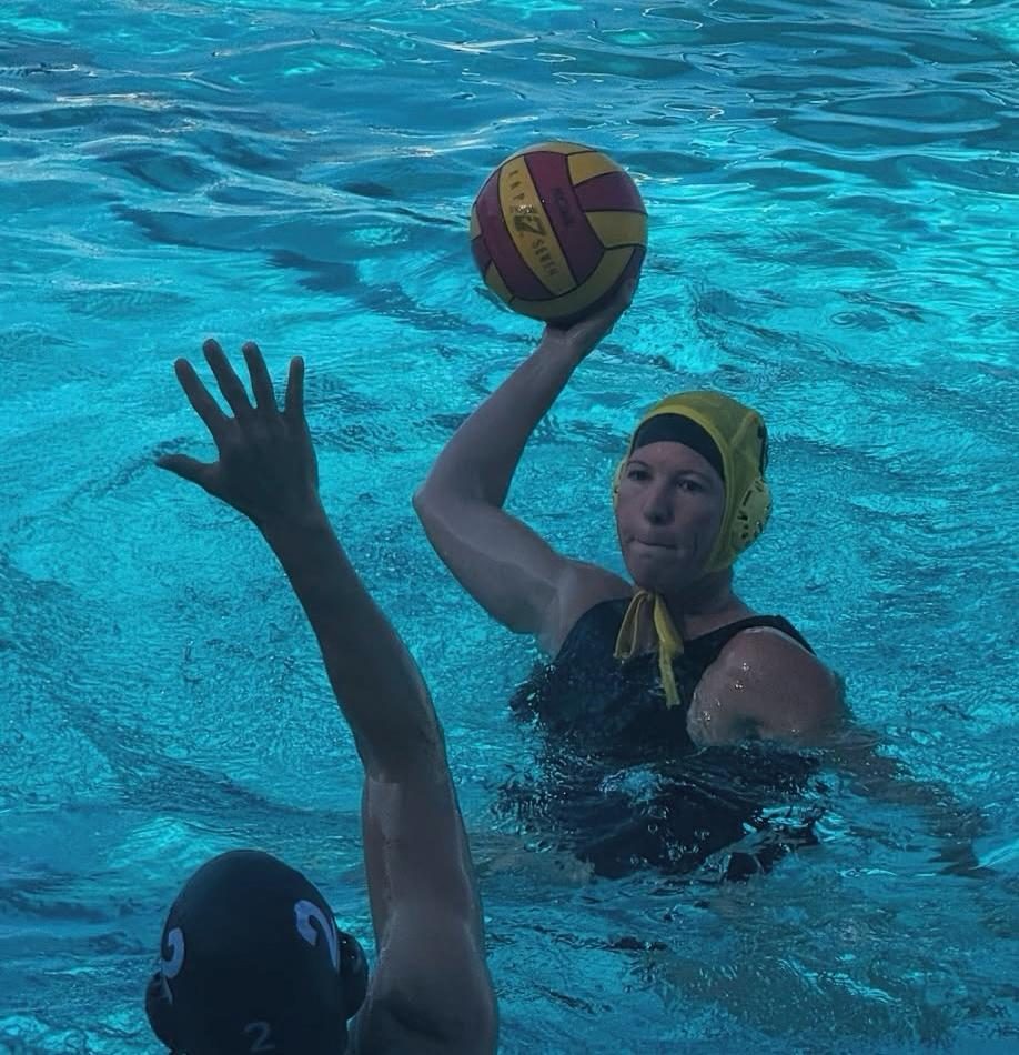 Women's water polo player shooting